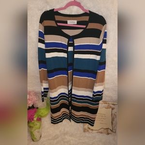 Womens long blazer, colors are tan, white, blue, cream, black and brown.